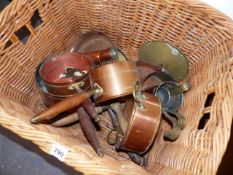 A SET OF COPPER SAUCEPANS,ETC.