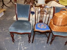 THREE ANTIQUE SIDE CHAIRS AND A MAHOGANY COFFEE TABLE.