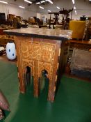 AN EASTERN INLAID OCCASIONAL TABLE.