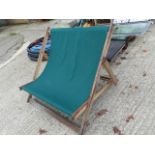 A LARGE DECK CHAIR.