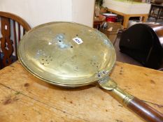 A VICTORIAN WARMING PAN.