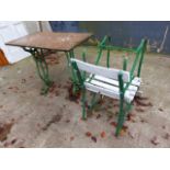 A MARBLE TOP GARDEN TABLE WITH PAINTED CAST IRON BASE TOGETHER WITH A PAIR OF SIMILAR CHAIRS.