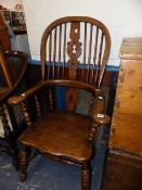 A WINDSOR COUNTRY ARMCHAIR.