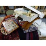 A QTY OF ANTIQUE AND LATER CUSHIONS AND TEXTILES.