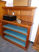 AN ANTIQUE PITCH PINE BOOKCASE.