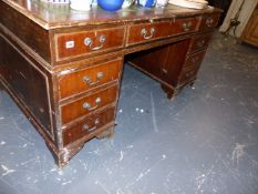 A MAHOGANY PEDESTAL DESK.