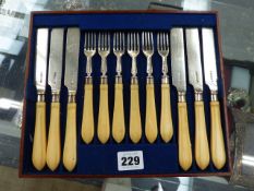 A SET OF SILVER HALLMARKED DESSERT CUTLERY.