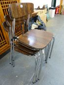 A SET OF FOUR RETRO STACKING KITCHEN CHAIRS.