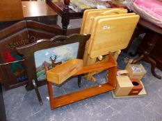 A DARTBOARD WITH CABINET, A SET OF NESTING TABLES,ETC.