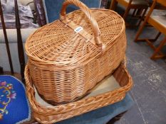 A PICNIC BASKET AND A BREAD BASKET.