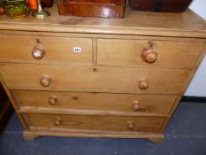 A VICTORIAN PINE CHEST OF DRAWERS.