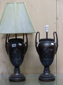 A PAIR OF BRONZE TWO HANDLED BALUSTER OIL LAMP BASES NOW FITTED FOR ELECTRICITY CAST WITH ANCIENT