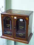 AN EDWARDIAN MARQUETRY MAHOGANY CIGAR CABINET, THE FRONT WITH BEVELLED GLASS ROUND ARCH GLAZED DOORS