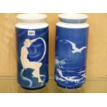 TWO COPENHAGEN CYLINDRICAL VASES, ONE DECORATED WITH SEAGULLS FLYING OVER WAVES AND THE OTHER WITH