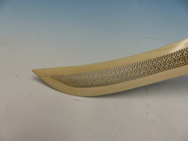 AN INDIAN IVORY PAGE TURNER, THE PIERCED SCIMITAR SHAPE BLADE ATTACHED TO A HANDLE CARVED WITH AN - Image 7 of 13
