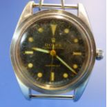 A VINTAGE ROLEX OYSTER PERPETUAL SUBMARINER BREVET 6204 WATCH, CASE NUMBER 988964. BELONGING TO JOHN