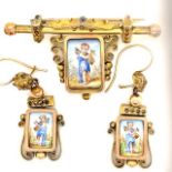 A VICTORIAN YELLOW METAL BROOCH AND EARRING SUITE IN THE AESTHETIC TASTE EACH INSET WITH FINELY