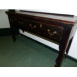 AN ANTIQUE PINE DRESSER WITH TWO APRON DRAWERS OVER CUT WORK SHAPED LEGS. W 139 x D 38.5 x H 76cms