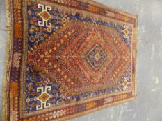 A PERSIAN SHIRAZ RUG 245 x 185cms.