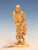 HARUCHIKA, A MARINE IVORY FIGURE OF A WORKMAN SURPRISED BY A SNAKE, SIGNED. H 19.5cms.