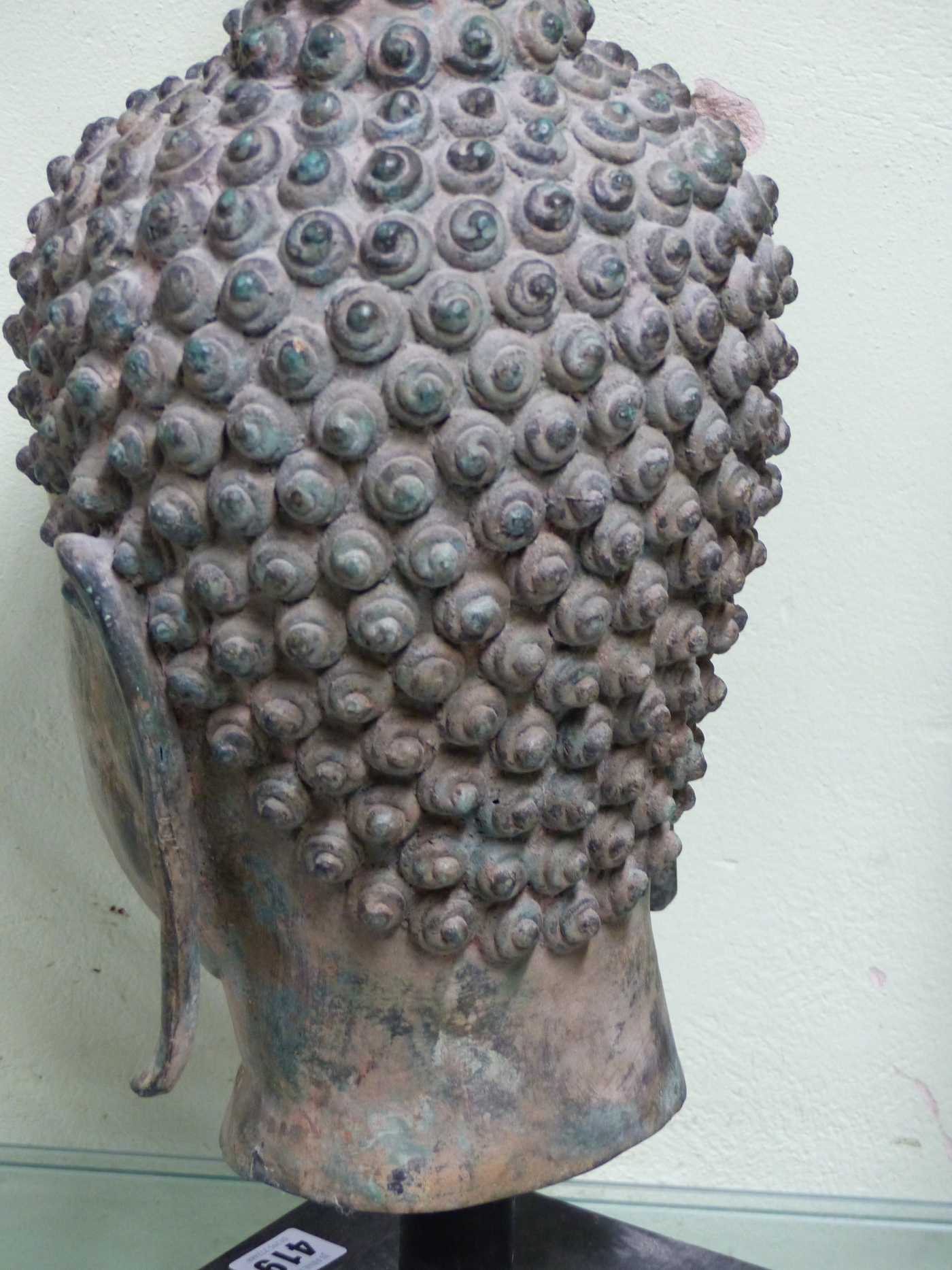 A THAI BRONZE HEAD OF THE BUDDHA, CURLED HAIR ABOVE HIS LONG LOBED EARS, HIS USNISA WITH FLAME - Image 6 of 10