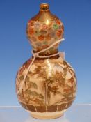 KOZAN, A SATSUMA DOUBLE GOURD VASE, THE UPPER FLORAL BAND ABOVE A GATHERING BELOW A FLOWERING CHERRY