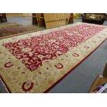 AN IMPRESSIZE ORIENTAL CARPET OF PERSIAN ZEIGLER DESIGN 890 x 370cms.