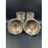 A PAIR OF SILVER PLATE FLARED COASTERS TOGETHER WITH TWO FURTHER OPEN WORK PLATED COASTERS.