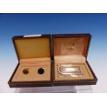 A BOXED DUNHILL PARCEL GILT PAGE MARKER TOGETHER WITH A PAIR OF CUFFLINKS WITH BLUE ENAMEL AND