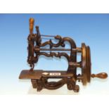 A 19th.C.CAST IRON FRAMED MINIATURE SEWING MACHINE, UNSIGNED BUT POSSIBLY THE GLOBE BY JAMES WEIR,