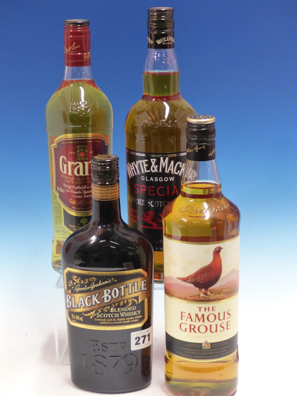 WHISKY. GRAHAM'S BLACK BOTTLE, GRANTS, WHYTE & MACKAY TOGETHER WITH FAMOUS GROUSE. (4)