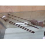 A SET OF THREE FIRE IRONS, TONGS, SHOVEL AND POKER, THE BALUSTER HANDLES WITH ACORN FINIALS.