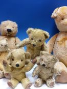 A COLLECTION OF SIX TEDDY BEARS, POSSIBLY MERRYTHOUGHT OR CHAD VALLEY, THE LARGEST. H 70cms TOGETHER