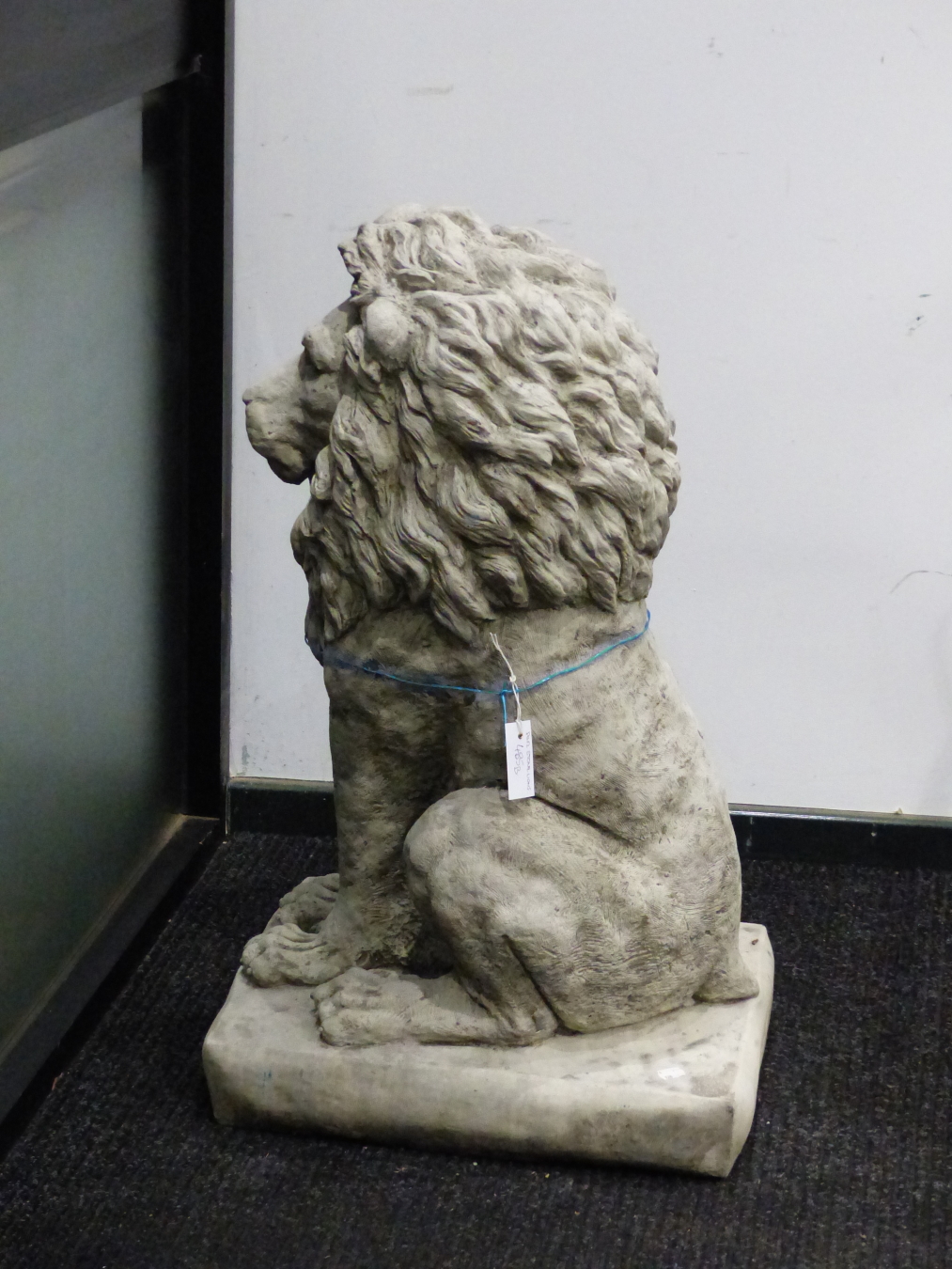 A PAIR OF COMPOSITION STONE LIONS SEATED ON RECTANGULAR BASES. H 89cms. - Image 5 of 5