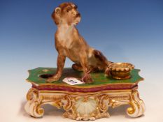 A JACOB PETTIT INKSTAND SURMOUNTED BY A DOGUE DE BORDEAUX SEATED ON THE GILT GREEN TOP WITH A