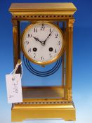 A FRENCH GILT METAL MOUNTED BEVELLED GLASS CASED MANTEL CLOCK STRIKING ON A COILED ROD, THE