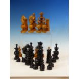 A 19th C. FRENCH REGENCE PATTERN BOX AND EBONY CHESS SET, THE KINGS. H 10cms. TOGETHER WITH A TOOLED