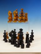 A 19th C. FRENCH REGENCE PATTERN BOX AND EBONY CHESS SET, THE KINGS. H 10cms. TOGETHER WITH A TOOLED