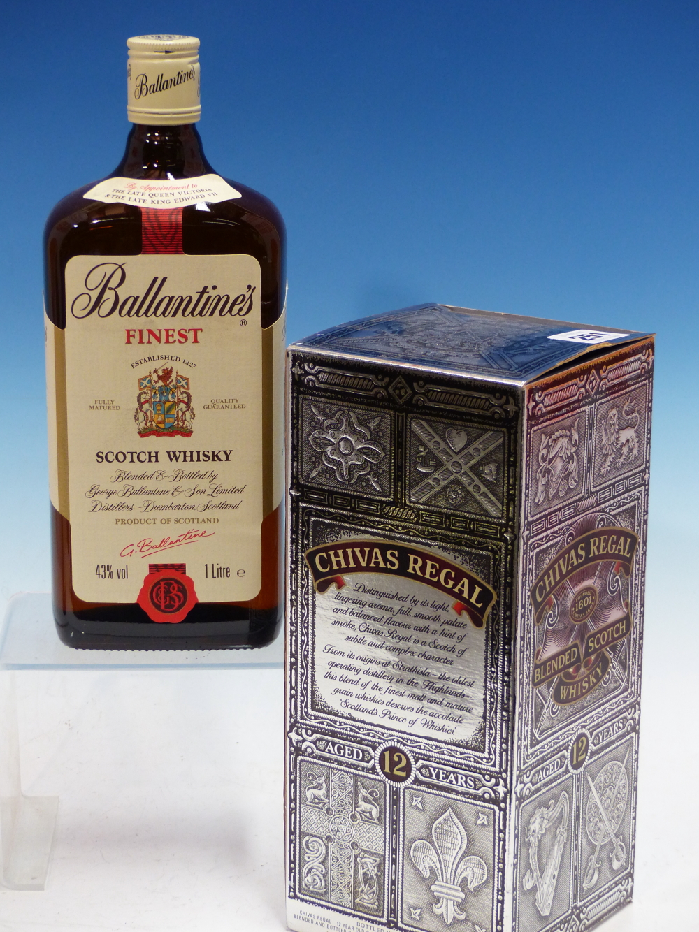 WHISKY. CHIVAS REGAL 1 x 1L.BOTTLE, BOXED TOGETHER WITH BALLENTINES FINEST 1 x 1L.BOTTLE. (2)