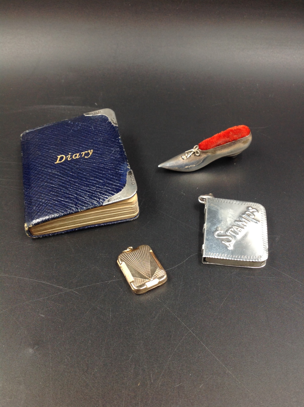 A SILVER HALLMARKED SHOE FORM PIN CUSHION, TOGETHER WITH A SILVER STAMP HOLDER, AND A WALKER'S - Image 2 of 17