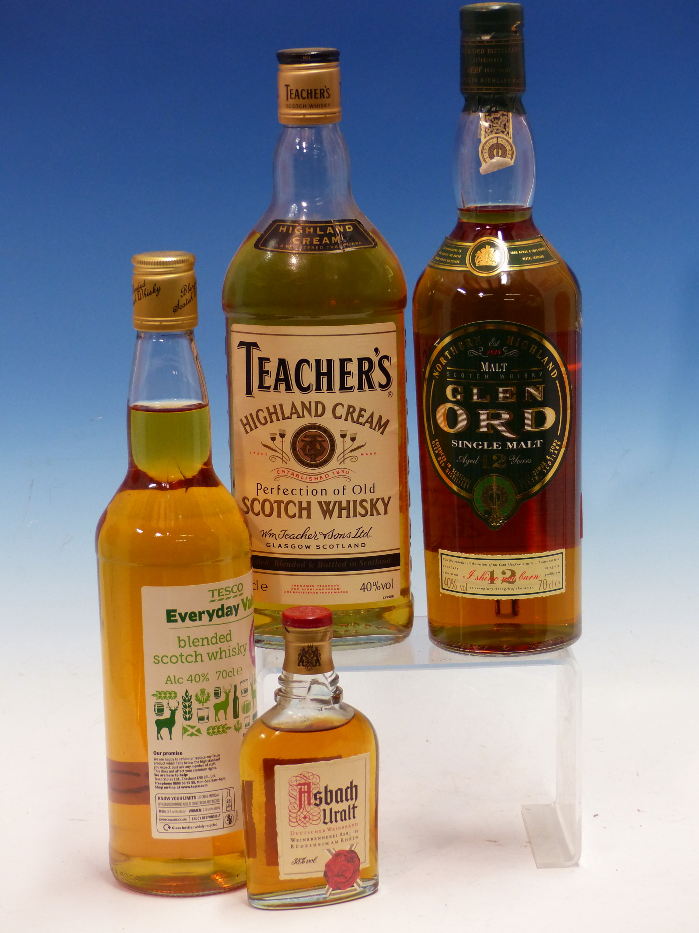 WHISKY. GLEN ORD 12 YEAR SINGLE MALT TOGETHER WITH TEACHER'S HIGHLAND CREAM AND TWO OTHERS. (4)