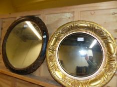 TWO CIRCULAR MIRRORS, THE SLIGHTLY CONVEX EXAMPLE WITHIN GILT FRAME WITH ALTERNATING OVAL