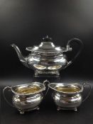 A SILVER HALLMARKED THREE PART TEA SET, DATED 1930 FOR HARRISON BROTHERS & HOWSON (GEORGE HOWSON)