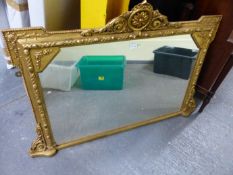 AN ANTIQUE GILT GESSO FRAMED OVERMANTLE MIRROR. 160 x 80cms.