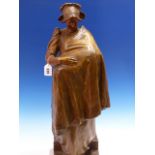 A BRONZED TERRACOTTA FIGURE POSSIBLY BY GOLDSCHEIDER OF A MOTHER WEARING A LACE HAT AND CARRYING HER