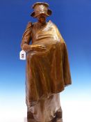 A BRONZED TERRACOTTA FIGURE POSSIBLY BY GOLDSCHEIDER OF A MOTHER WEARING A LACE HAT AND CARRYING HER