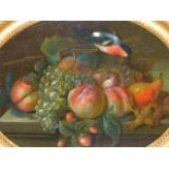 OLD MASTER SCHOOL. A PAIR OF OVAL STILL LIFES OF FRUIT WITH EXOTIC BIRDS, OIL ON PANEL IN CONFORMING