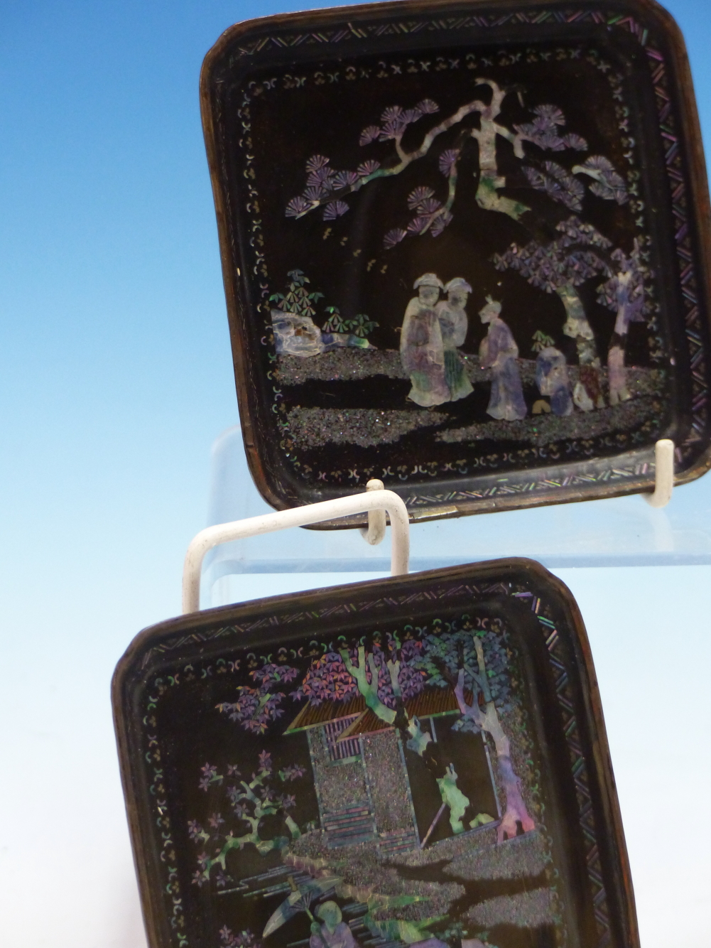 A PAIR OF LAC BURGAUTE SQUARE TRAYS, THE METAL MOUNTED RINGS ENCLOSING MOTHER OF PEARL FIGURES IN - Image 4 of 14