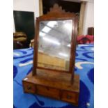 A 19th.C.WALNUT AND MAHOGANY SMALL DRESSING TABLE SWING MIRROR WITH A THREE DRAWER BASE. W.40 x H.