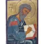 AN ICON OF A SAINT WRITING IN A BOOK, POSSIBLY ST PAUL, THE GREY CLOTHED FIGURE AGAINST A GILT